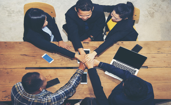 team-work-concept-business-people-joining-hands-business-people-team-holding-hands-successful-business-meeting