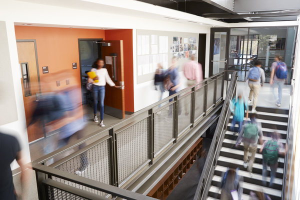 busy-high-school-corridor-during-recess-with-blurred-students-and-staff