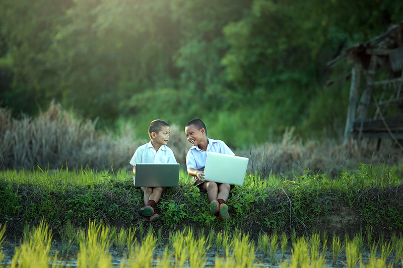 young-boy-playing-laptop