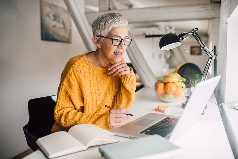older-woman-working-on-laptop